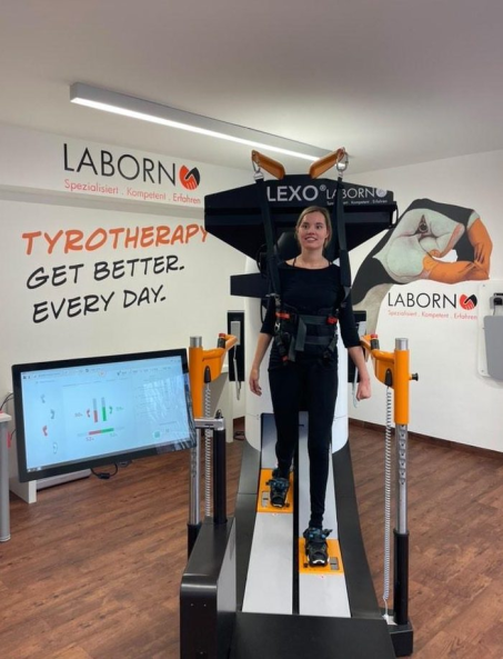 Woman is training on Lexo gait trainer