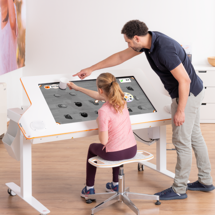 Girl plays with Myro on inverted screen