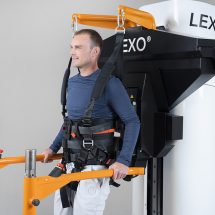 Patient trains on robotic gait trainer Lexo