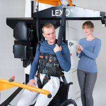 Patient gets transferred into Lexo gait trainer
