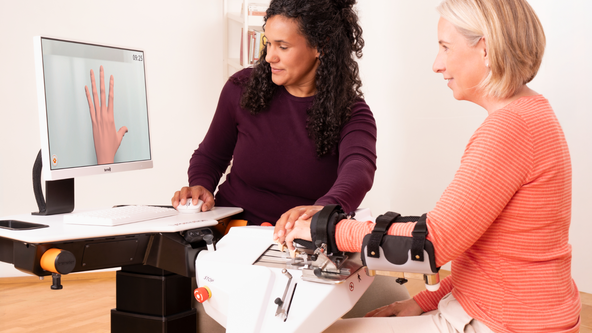 Woman trains with Amadeo with the guidance of a therapist