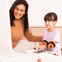 Therapist trains with young girl on Amadeo