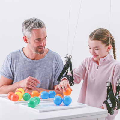 Therapist and child train with Diego