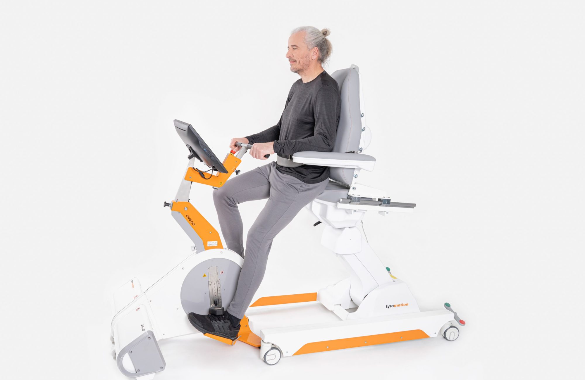 Patient on Omego Plus leg rehabilitation device