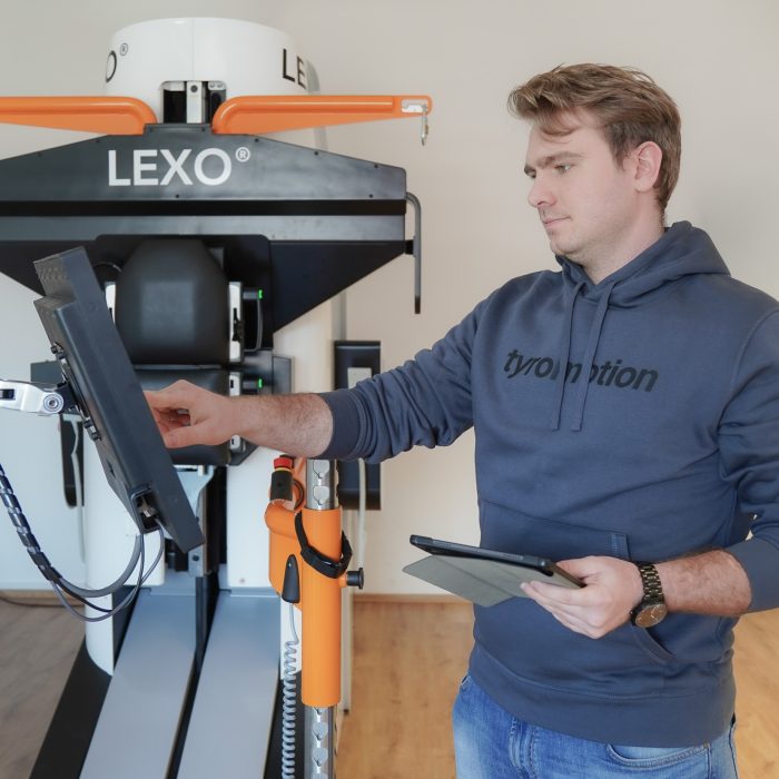 Male Tyromotion employee doing service & customer care activities at Lexo
