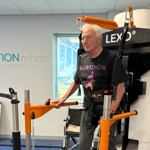Patient Mel Neale at Gait trainer Lexo in rehab center MOTIONrehab