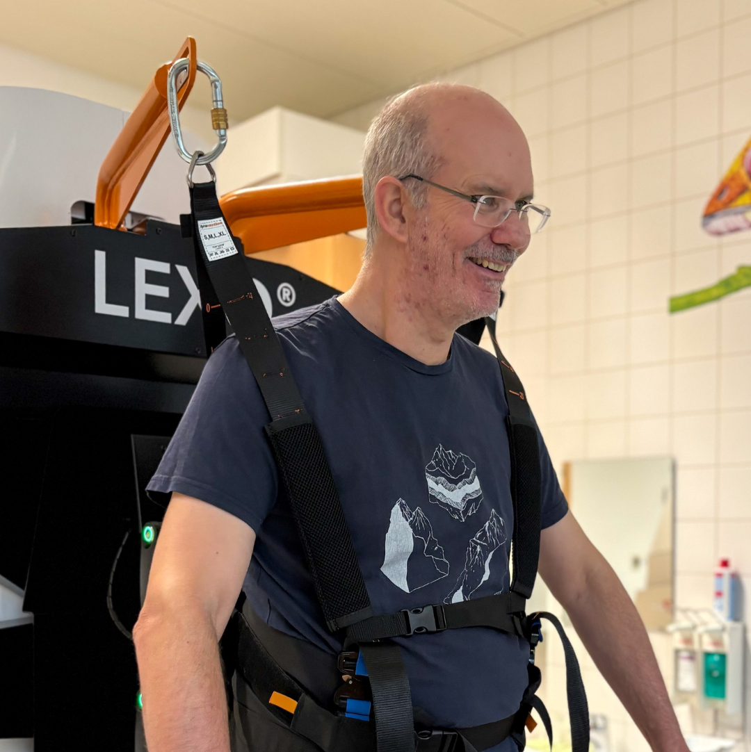 Patient Alexander Raab who has an n incomplete cervical spinal cord injury at the Lexo gait trainer