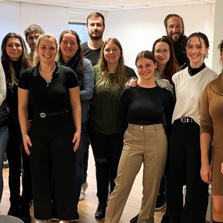 A group of people from FH Kärnten Students in the Tyromotion Showroom Graz