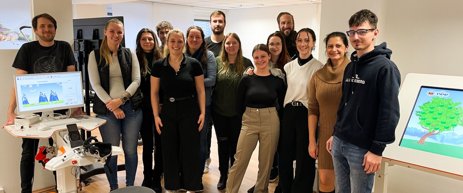 A group of people from FH Kärnten Students in the Tyromotion Showroom Graz