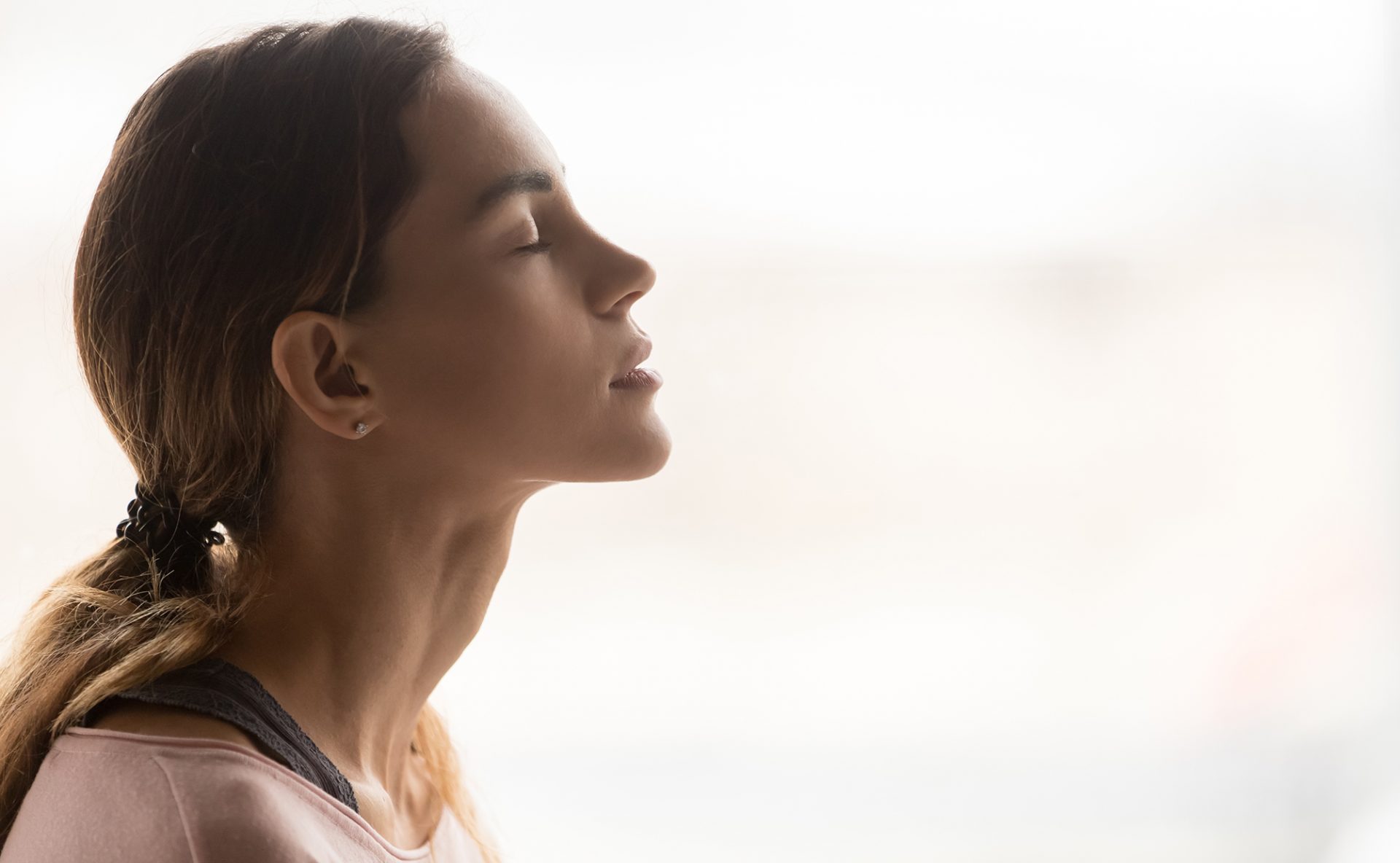 Woman thinking with closed eyes
